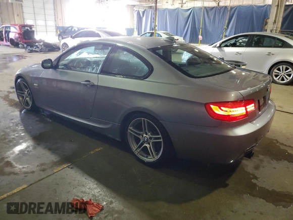 2011 BMW 3 Series 335is with VIN WBAKG1C56BE599457, listed as a Copart auction lot 52412655 with 134,497 mi miles and Clean title. Bid and sale history available at DreamBid. Image 2.