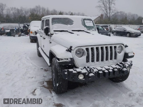2023 Jeep Gladiator Overland z VIN 1C6HJTFG6PL544489, wystawiony jako IAAI lot #41311654 z przebiegiem 37 630 mil mil oraz . Historia ofert i sprzedaży dostępna na DreamBid. Obrazek 1.