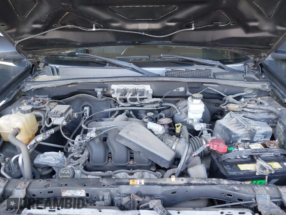 2008 Mercury Mariner Premier with VIN 4M2CU97198KJ30843, listed as a IAAI auction lot 42579794 with 109,983 mi miles and . Bid and sale history available at DreamBid. Image 10.
