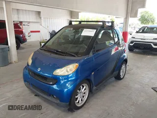 2008 Smart fortwo Pure with VIN WMEEJ31X28K123879, listed as a IAAI auction lot 42258663 with 93,056 mi miles and . Bid and sale history available at DreamBid. Image 6.