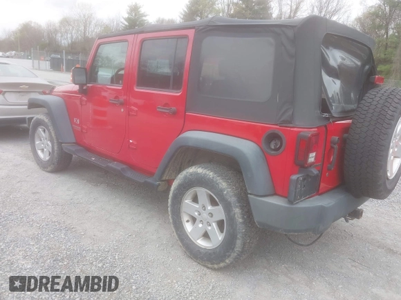2008 Jeep Wrangler Unlimited X with VIN 1J8GA39128L562347, listed as a IAAI auction lot 41912669 with 106,040 mi miles and . Bid and sale history available at carsss.com. Image 3.