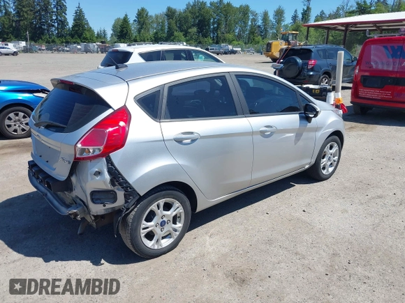 2016 Ford Fiesta SE z VIN 3FADP4EJ0GM122392, wystawiony jako IAAI lot #42364419 z przebiegiem 98 357 mil mil oraz . Historia ofert i sprzedaży dostępna na DreamBid. Obrazek 4.