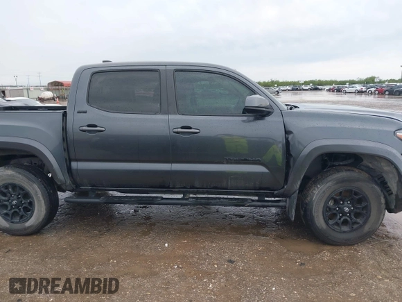 2022 Toyota Tacoma SR5 with VIN 3TMAZ5CN9NM195132, listed as a IAAI auction lot 42383482 with 51,011 mi miles and . Bid and sale history available at DreamBid. Image 14.
