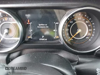 2020 Jeep Wrangler Unlimited Freedom with VIN 1C4HJXDG2LW186027, listed as a IAAI auction lot 42449664 with 87,869 mi miles and . Bid and sale history available at DreamBid. Image 7.