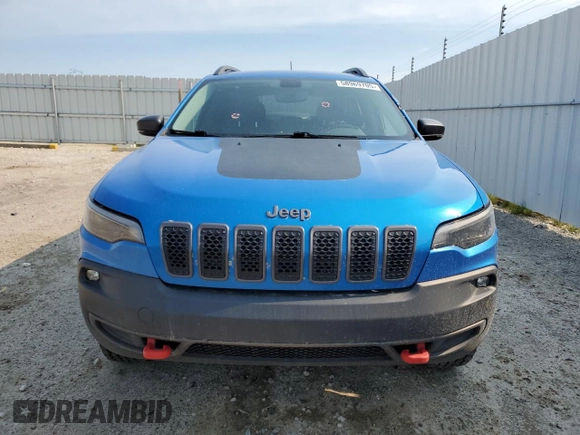 2019 Jeep Cherokee Trailhawk with VIN 1C4PJMBX7KD277477, listed as a Copart auction lot 58969705 with 139,521 mi miles and Salvage title. Bid and sale history available at DreamBid. Image 5.
