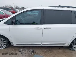 2014 Toyota Sienna XLE with VIN 5TDYK3DC5ES437127, listed as a IAAI auction lot 41561709 with 119,514 mi miles. Bid and sale history available at carsss.com. Image 14.
