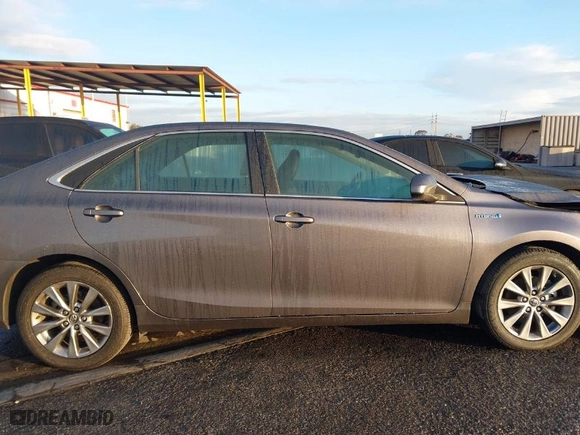 2016 Toyota Camry Hybrid LE with VIN 4T1BD1FK7GU194066, listed as a IAAI auction lot 41425506 with NaN miles. Bid and sale history available at carsss.com. Image 14.