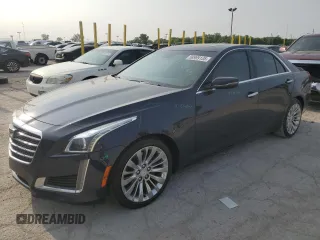 2017 Cadillac CTS Luxury AWD with VIN 1G6AX5SX7H0141380, listed as a Copart auction lot 58999135 with 91,003 mi miles and Salvage title. Bid and sale history available at DreamBid. Image 1.