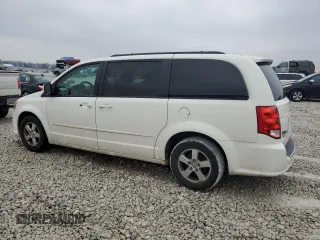 2012 Dodge Grand Caravan SXT with VIN 2C4RDGCG7CR364598, listed as a Copart auction lot 81848314 with 173,022 mi miles and Non Repairable. Bid and sale history available at DreamBid. Image 2.