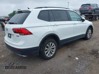 2020 Volkswagen Tiguan S with VIN 3VV0B7AX0LM140910, listed as a IAAI auction lot 42622385 with 80,998 mi miles and . Bid and sale history available at DreamBid. Image 4.