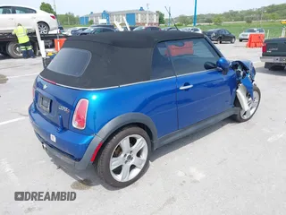 2006 MINI Convertible S with VIN WMWRH335X6TK59110, listed as a IAAI auction lot 42089085 with 101,303 mi miles and . Bid and sale history available at DreamBid. Image 4.