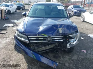 2021 Volkswagen Tiguan SE with VIN 3VV3B7AX9MM051125, listed as a IAAI auction lot 41527014 with 68,847 mi miles. Bid and sale history available at carsss.com. Image 12.