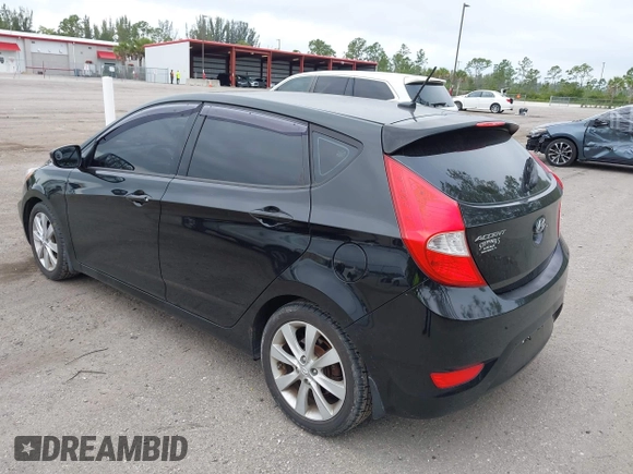2013 Hyundai Accent SE with VIN KMHCU5AE8DU109616, listed as a IAAI auction lot 42051364 with 96,739 mi miles. Bid and sale history available at carsss.com. Image 3.