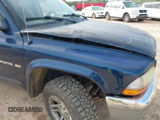 2002 Dodge Dakota SLT z VIN 1B7HG48N82S678086, wystawiony jako IAAI lot #42189540 z przebiegiem Nie podano mil oraz . Historia ofert i sprzedaży dostępna na DreamBid. Obrazek 12.