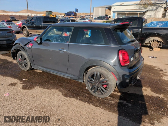 2016 MINI Hardtop John Cooper Works with VIN WMWXM9C50GT997764, listed as a Copart auction lot 52826365 with 82,430 mi miles and Salvage title. Bid and sale history available at DreamBid. Image 2.