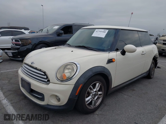 2011 MINI Hardtop with VIN WMWSU3C56BT093403, listed as a IAAI auction lot 42795188 with 123,454 mi miles and . Bid and sale history available at DreamBid. Image 2.