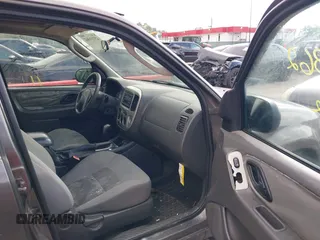 2006 Ford Escape XLT with VIN 1FMCU93106KA37648, listed as a IAAI auction lot 42719362 with 184,321 mi miles and . Bid and sale history available at DreamBid. Image 5.