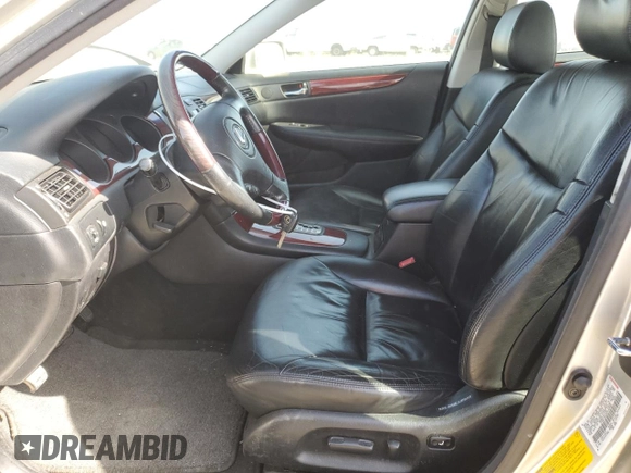 2002 Lexus ES 300 with VIN JTHBF30G920050886, listed as a Copart auction lot 57087355 with 131,304 mi miles and Salvage title. Bid and sale history available at DreamBid. Image 7.