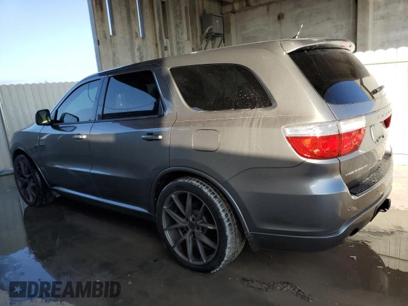 2013 Dodge Durango R/T with VIN 1C4SDHCT3DC528749, listed as a Copart auction lot 44026835 with 153,454 mi miles and Clean title. Bid and sale history available at DreamBid. Image 2.