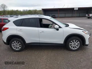 2016 Mazda CX-5 Touring with VIN JM3KE4CY0G0903723, listed as a IAAI auction lot 41966516 with 107,569 mi miles. Bid and sale history available at carsss.com. Image 13.