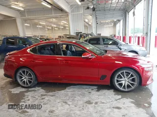 2022 Genesis G70 2.0T with VIN KMTG34TA3NU086889, listed as a IAAI auction lot 42205079 with 51,792 mi miles and . Bid and sale history available at DreamBid. Image 14.