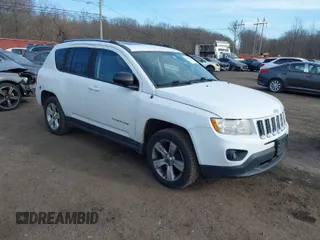2012 Jeep Compass Latitude with VIN 1C4NJDEB5CD584509, listed as a IAAI auction lot 41672784 with 166,271 mi miles. Bid and sale history available at carsss.com. Image 1.