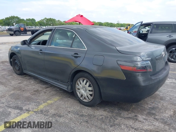 2007 Toyota Camry CE with VIN 4T1BE46K07U097127, listed as a IAAI auction lot 42091193 with 148,623 mi miles. Bid and sale history available at carsss.com. Image 3.