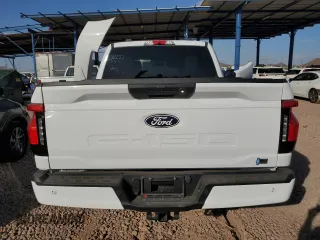 2024 Ford F-150 Lightning XLT with VIN 1FTVW3LK8RWG07888, listed as a Copart auction lot 87741505 with 2,313 mi miles and Salvage title. Bid and sale history available at DreamBid. Image 6.