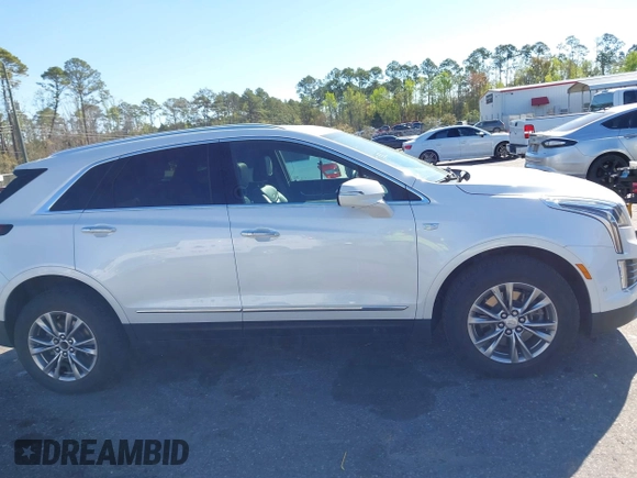 2021 Cadillac XT5 FWD Premium Luxury with VIN 1GYKNCR48MZ234688, listed as a IAAI auction lot 41827211 with 36,797 mi miles and . Bid and sale history available at DreamBid. Image 13.
