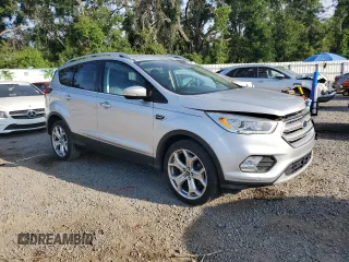 2019 Ford Escape Titanium with VIN 1FMCU9J92KUA78127, listed as a Copart auction lot 58488255 with 82,956 mi miles and Non repairable. Bid and sale history available at DreamBid. Image 4.