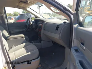 2005 Dodge Durango SLT z VIN 1D4HB48N65F500675, wystawiony jako IAAI lot #42743523 z przebiegiem 301 938 mil mil oraz . Historia ofert i sprzedaży dostępna na DreamBid. Obrazek 5.