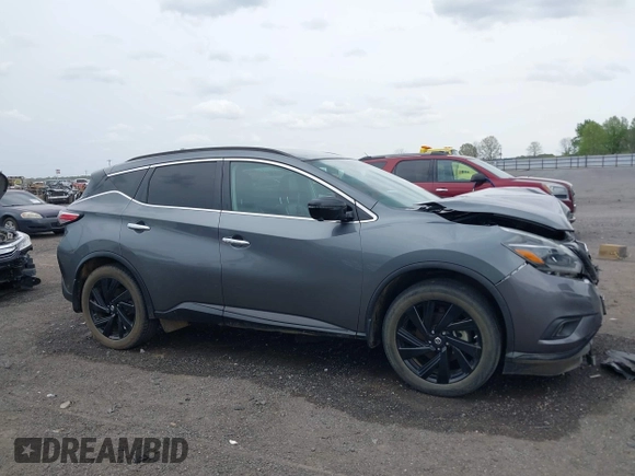 2018 Nissan Murano S with VIN 5N1AZ2MG8JN160124, listed as a IAAI auction lot 41921370 with 92,797 mi miles and . Bid and sale history available at DreamBid. Image 13.