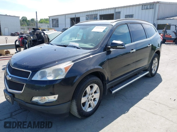 2012 Chevrolet Traverse 1LT z VIN 1GNKVGED7CJ264501, wystawiony jako IAAI lot #42114940 z przebiegiem 175 303 mil mil oraz . Historia ofert i sprzedaży dostępna na DreamBid. Obrazek 2.