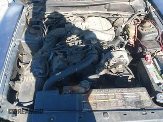 1996 Ford Mustang with VIN 1FALP4042TF140884, listed as a IAAI auction lot 41279611 with 233,047 mi miles. Bid and sale history available at carsss.com. Image 10.