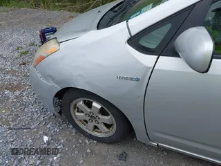 2008 Toyota Prius z VIN JTDKB20U087743049, wystawiony jako IAAI lot #42373258 z przebiegiem 221 497 mil mil oraz . Historia ofert i sprzedaży dostępna na DreamBid. Obrazek 6.