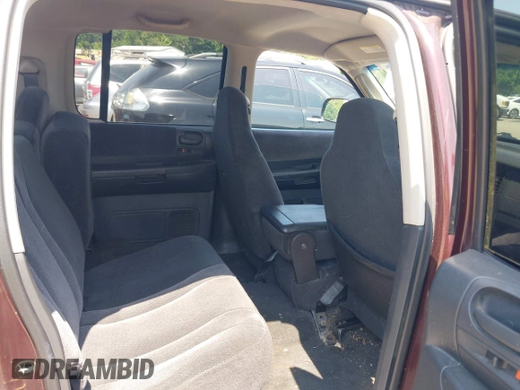 2004 Dodge Dakota SLT with VIN 1D7HG48N24S556431, listed as a IAAI auction lot 42591078 with 213,777 mi miles and . Bid and sale history available at DreamBid. Image 8.
