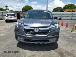 2017 Honda Ridgeline RTL-E with VIN 5FPYK3F74HB027130, listed as a Copart auction lot 60146905 with 99,964 mi miles and Salvage title. Bid and sale history available at DreamBid. Image 5.