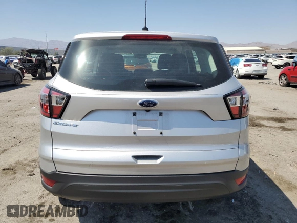 2017 Ford Escape S z VIN 1FMCU0F73HUD06275, wystawiony jako Copart lot #62875465 z przebiegiem 56 780 mil mil oraz Szkoda całkowita • Salvage title. Historia ofert i sprzedaży dostępna na DreamBid. Obrazek 6.