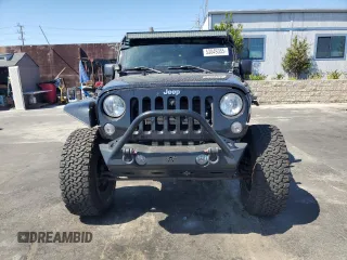 2014 Jeep Wrangler Unlimited Sahara z VIN 1C4BJWEG4EL164226, wystawiony jako Copart lot #53849355 z przebiegiem 82 145 mil mil oraz Szkoda całkowita • Salvage title. Historia ofert i sprzedaży dostępna na DreamBid. Obrazek 5.