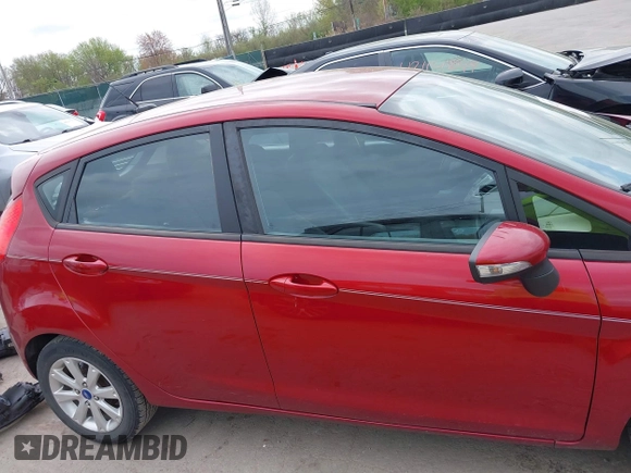 2013 Ford Fiesta SE with VIN 3FADP4EJXDM152463, listed as a IAAI auction lot 42122969 with 66,952 mi miles and . Bid and sale history available at DreamBid. Image 14.