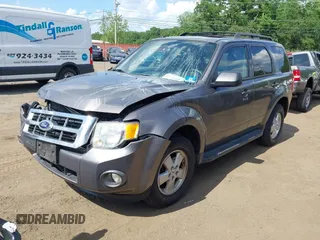 2012 Ford Escape XLT with VIN 1FMCU9D75CKC22907, listed as a IAAI auction lot 42571195 with 198,537 mi miles and . Bid and sale history available at DreamBid. Image 6.