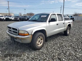2004 Dodge Dakota SLT with VIN 1D7HG48NX4S677465, listed as a Copart auction lot 51044735 with 196,854 mi miles and Clean Title. Bid and sale history available at carsss.com. Image 1.
