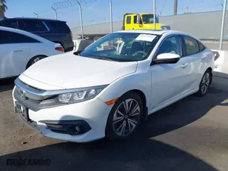2016 Honda Civic Sedan EX-T with VIN 19XFC1F32GE030370, listed as a IAAI auction lot 41213366 with 68,292 mi miles. Bid and sale history available at carsss.com. Image 2.