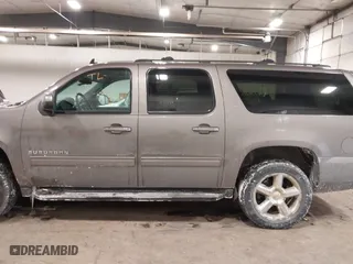 2013 Chevrolet Suburban LT with VIN 1GNSKJE76DR375916, listed as a IAAI auction lot 41588724 with 281,808 mi miles. Bid and sale history available at carsss.com. Image 15.