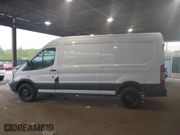 2015 Ford Transit Cargo z VIN 1FTNR2CM1FKA40154, wystawiony jako IAAI lot #42210986 z przebiegiem 164 324 mil mil oraz . Historia ofert i sprzedaży dostępna na DreamBid. Obrazek 14.