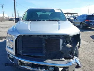 2015 Ford F-150 XLT with VIN 1FTEW1C8XFKE17196, listed as a IAAI auction lot 41414904 with 150,866 mi miles and . Bid and sale history available at carsss.com. Image 6.