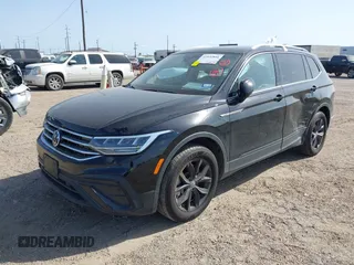2024 Volkswagen Tiguan SE with VIN 3VVNB7AXXRM031028, listed as a IAAI auction lot 41832841 with 16,170 mi miles and . Bid and sale history available at DreamBid. Image 2.
