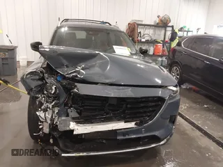 2022 Mazda CX-9 Grand Touring with VIN JM3TCBDY3N0619674, listed as a IAAI auction lot 41609191 with 32,722 mi miles and . Bid and sale history available at carsss.com. Image 13.