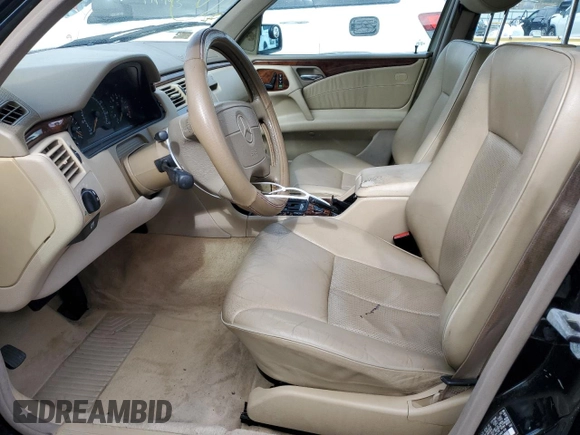 1998 Mercedes-Benz E-Class with VIN WDBJF65F9WA634931, listed as a Copart auction lot 87045104 with 188,331 mi miles and Salvage Title. Bid and sale history available at carsss.com. Image 7.