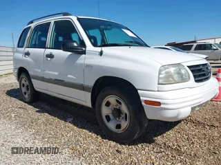 2002 Suzuki Vitara JLS z VIN 2S3TE52V726110298, wystawiony jako IAAI lot #41791134 z przebiegiem 186 909 mil mil oraz . Historia ofert i sprzedaży dostępna na DreamBid. Obrazek 1.